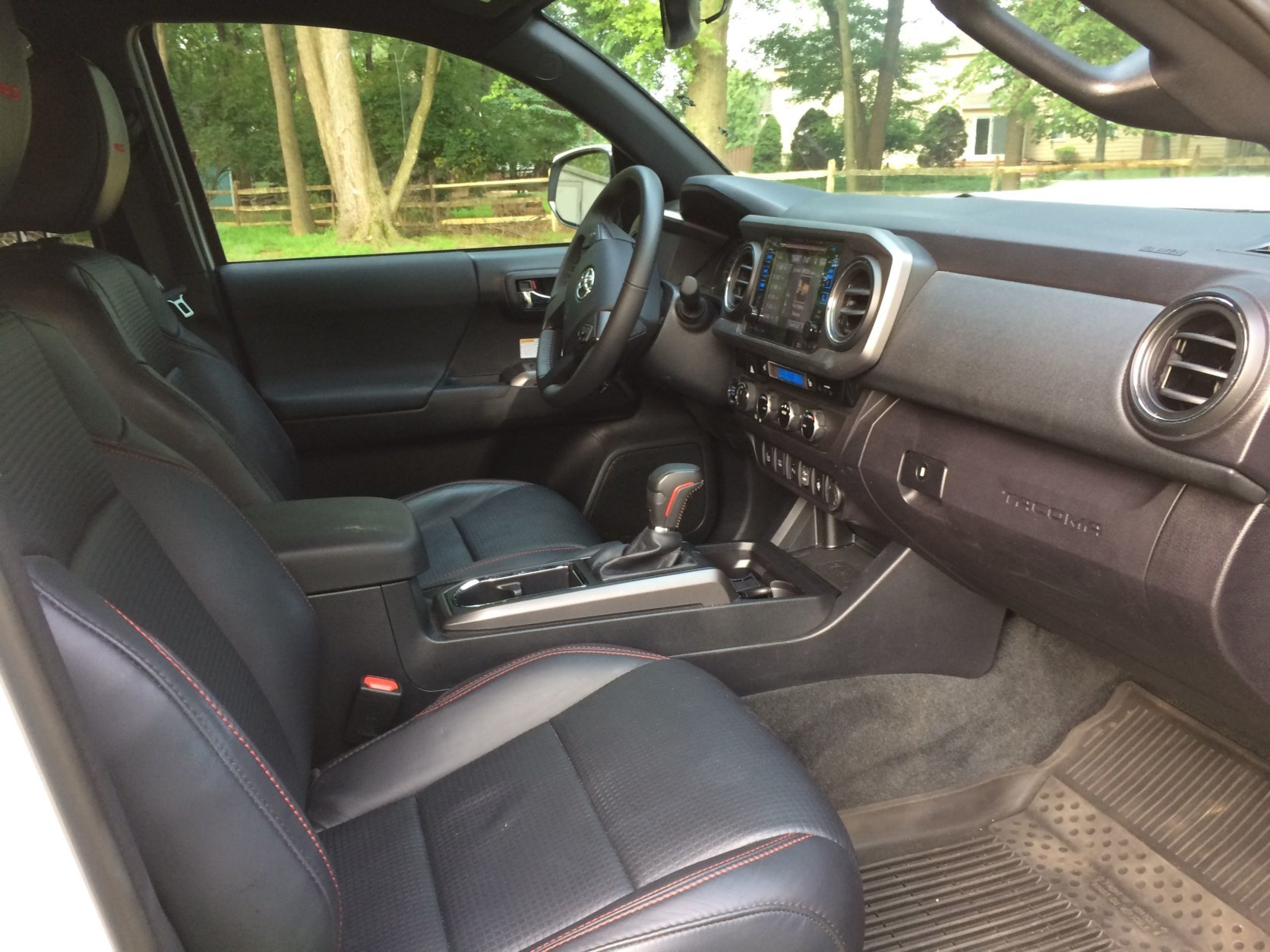 Inside the $44,814 Tacoma TRD, this truck is anything but roughing it with its leather-trimmed seats and steering wheel, so Parris said "Be careful what mess you track in." (WTOP/Mike Parris)