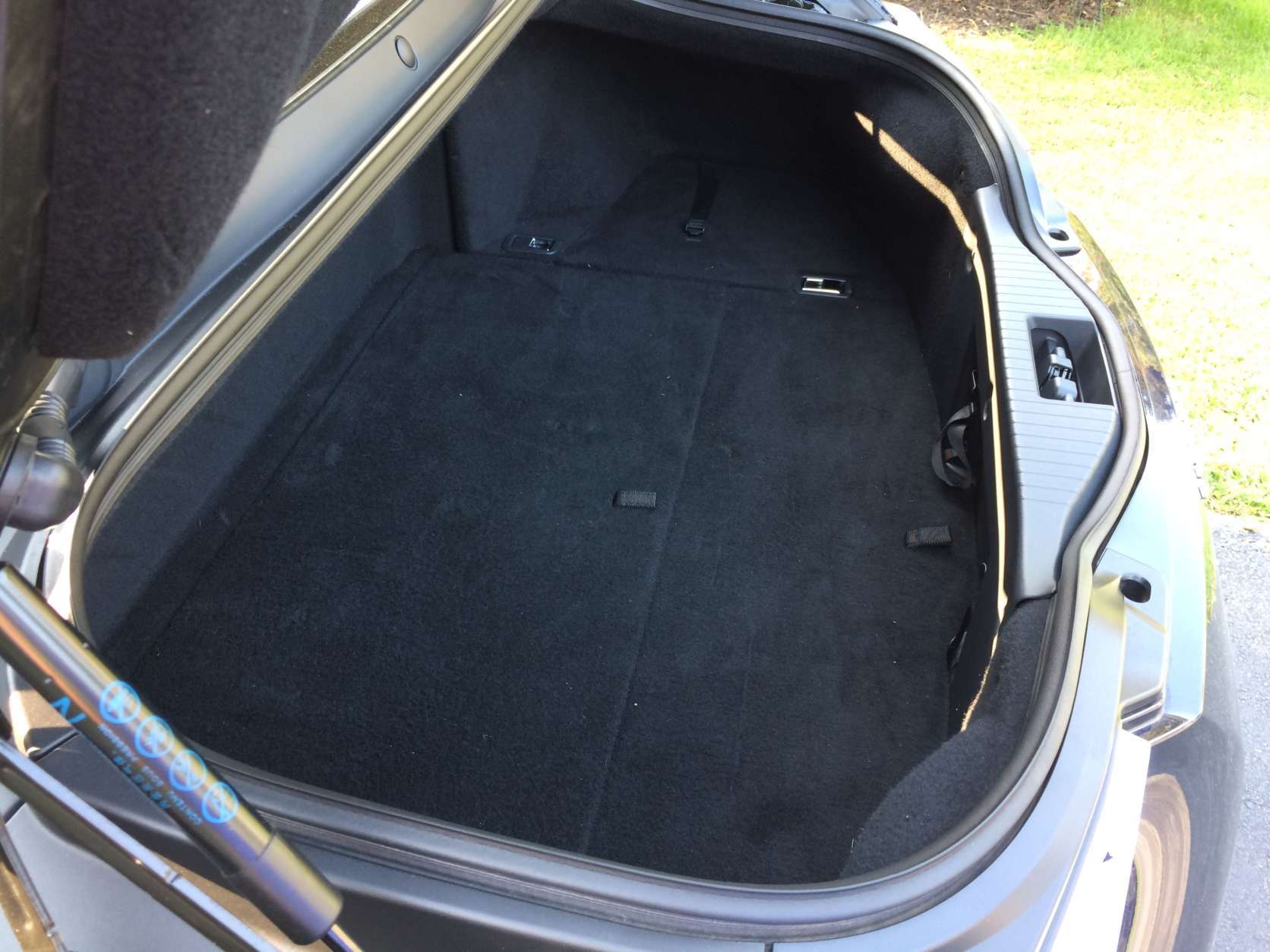 The trunk isn’t large but it's usable; it looks like a golf bag might just fit in there. (WTOP/Mike Parris) 