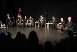 Sen. Chris Van Hollen, D-Md., (left, with microphone) was among the lawmakers who joined Bethesda-Chevy Chase High School students and others for a panel discussion about gun violence Tuesday, March 13, 2018. (WTOP/Michelle Basch)