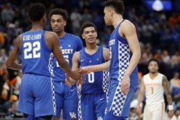 Kentucky's Shai Gilgeous-Alexander (22), PJ Washington (25), Quade Green (0) and Kevin Knox (5) celebrate in the final seconds of their win over Tennessee in an NCAA college basketball championship game at the Southeastern Conference tournament Sunday, March 11, 2018, in St. Louis. (AP Photo/Jeff Roberson)
