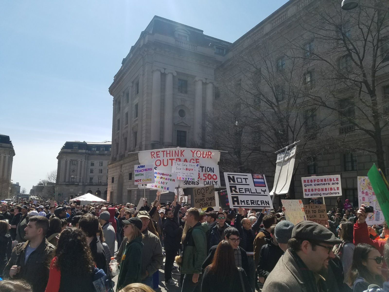 Signs pop up from the crowds at Saturday's March For Our Lives rally. (Courtesy Olivia Prieto) 