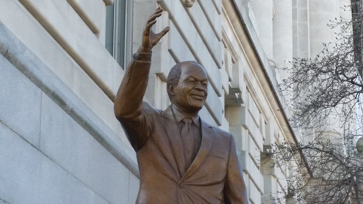 The eight-foot bronze statue of Barry was cast to look like he was waving. (WTOP/Kathy Stewart)