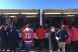The merchandise van outside the PreGame, which opened a full six hours before the puck dropped (yes, that's WTOP's own Ben Raby photobombing in the right-center of the frame). (WTOP/Noah Frank)