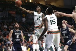 FILE - In this Nov. 25, 2017, file photo, Miami's Chris Lykes (2) goes to the basket during the second half of an NCAA college basketball game against North Florida, in Coral Gables, Fla. Lykes is 5-foot-7 and part of the most highly regarded recruiting class in coach Jim Larranaga’s seven seasons at Miami. (AP Photo/Lynne Sladky, File)
