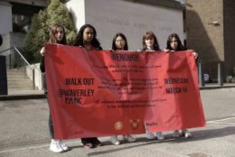Students, aged 17 &amp; 18, pose for photographs with a banner outside the front of the American School in London, after taking part in a 10am local-time, 17-minute walkout in the school playground, which was attended by approximately 300 students aged 14-18, Wednesday, March 14, 2018. From Maine to Hawaii, students planned to walk out of school Wednesday to protest gun violence in the biggest demonstration yet of the student activism that has emerged in response to last month's massacre of 17 people at Florida's Marjory Stoneman Douglas High School. (AP Photo/Matt Dunham)