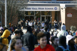 Students file out of Perry Hall High School in Perry Hall, Md., Wednesday, March 14, 2018, during a student walkout. Students across the country planned to participate in walkouts Wednesday to protest gun violence, one month after a deadly shooting inside a high school in Parkland, Fla. (AP Photo/Patrick Semansky)
