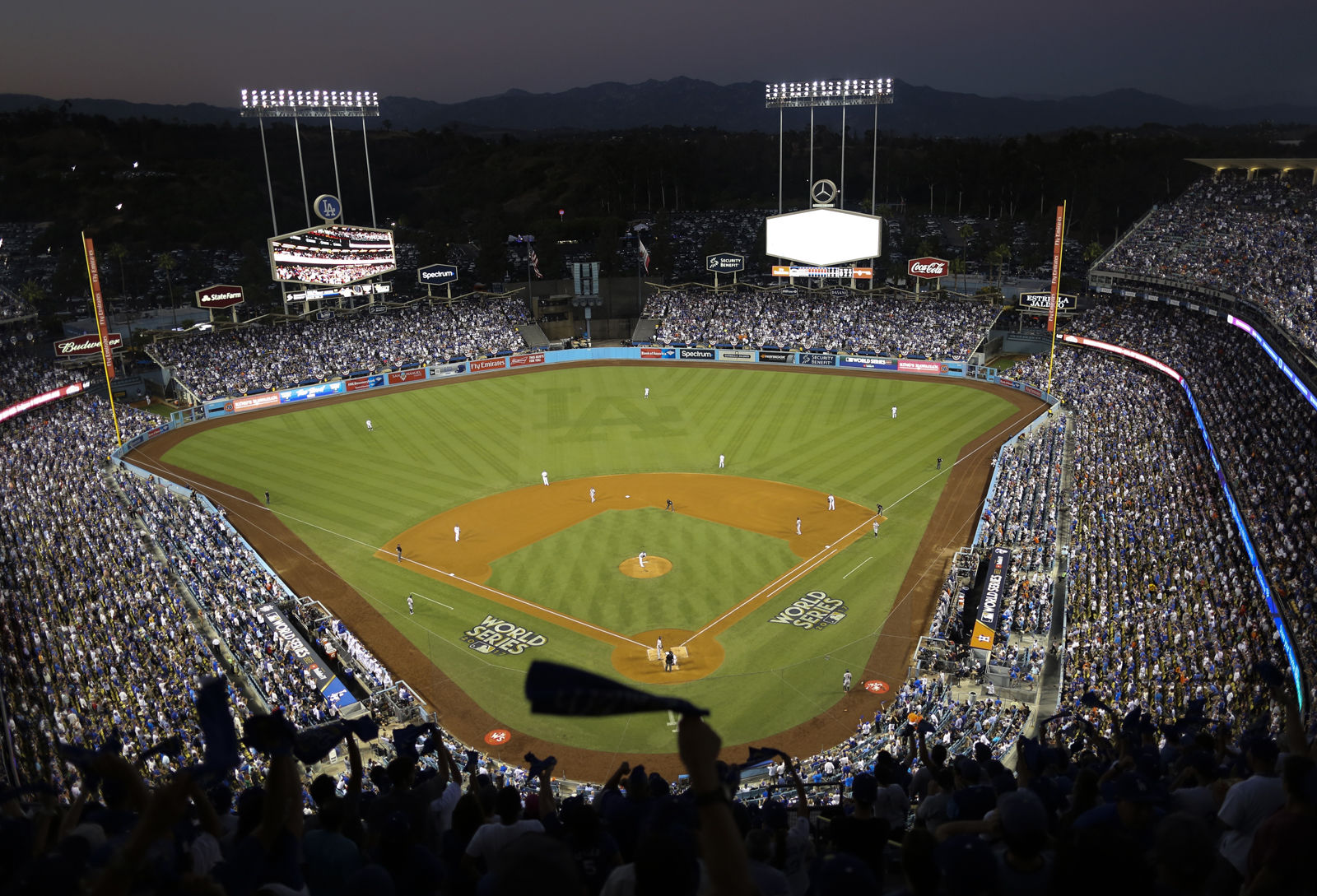 Dodgers Stadium, seen here during the 2017 World Series, is the third oldest stadium in baseball but its only No. 11 on the list with average cost of $73.83. File. (AP Photo/Tim Donnelly)