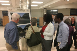 Bethesda residents review the final plans to make the intersection of River Road and Braeburn Parkway safer. (WTOP/Mike Murillo)