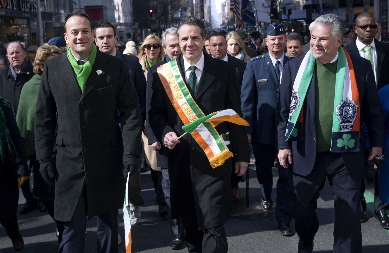 From left, Irish Prime Minister Leo Varadkar, New York Democratic Gov. Andrew Cuomo and Rep. Peter King, R-N.Y., walk along Fifth Avenue during the St. Patrick's Day parade Saturday, March 17, 2018, in New York.  A big event since the mid-1800s, the parade has been a celebration of Irish culture and of Irish immigrants, who once faced nativist calls for their exclusion from the workforce,  and from the country, when they began arriving in the city in huge numbers during the Irish Famine. (AP Photo/Craig Ruttle)