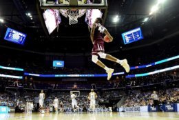 CHARLOTTE, NC - MARCH 18:  Robert Williams #44 of the Texas A&amp;M Aggies dunks on the North Carolina Tar Heels during the second round of the 2018 NCAA Men's Basketball Tournament at Spectrum Center on March 18, 2018 in Charlotte, North Carolina.  (Photo by Jared C. Tilton/Getty Images)