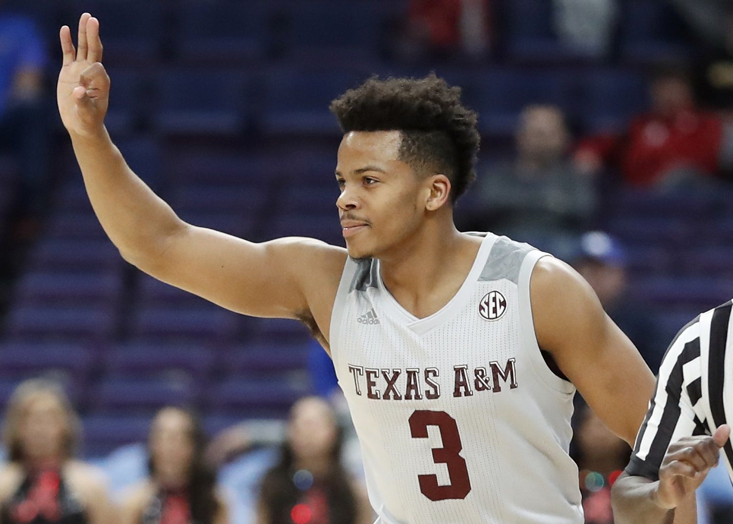 Texas A&amp;M's Admon Gilder gestures after making a 3-point basket during the first half in an NCAA college basketball game at the Southeastern Conference tournament Thursday, March 8, 2018, in St. Louis. (AP Photo/Jeff Roberson)