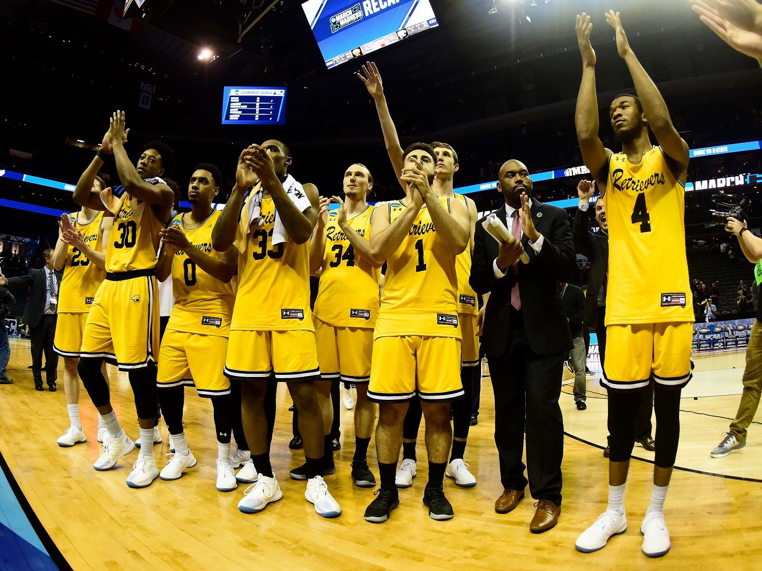CHARLOTTE, NC - MARCH 18: The UMBC Retrievers thank their fans after losing 50-43 to the Kansas State Wildcats during the second round of the 2018 NCAA Men's Basketball Tournament at Spectrum Center on March 18, 2018 in Charlotte, North Carolina.  (Photo by Jared C. Tilton/Getty Images)