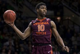 Virginia Tech's Justin Bibbs (10) grabs a rebound during the second half of an NCAA college basketball game against Notre Dame Saturday, Jan. 27, 2018, in South Bend, Ind. Virginia Tech won 80-75. (AP Photo/Robert Franklin)
