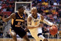 SAN DIEGO, CA - MARCH 16:  Jevon Carter #2 of the West Virginia Mountaineers handles the ball against Shaq Buchanan #11 of the Murray State Racers in the first half during the first round of the 2018 NCAA Men's Basketball Tournament at Viejas Arena on March 16, 2018 in San Diego, California.  (Photo by Sean M. Haffey/Getty Images)