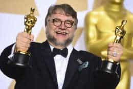 Guillermo del Toro, winner of the awards for best director and best picture for "The Shape of Water," poses in the press room at the Oscars on Sunday, March 4, 2018, at the Dolby Theatre in Los Angeles. (Photo by Jordan Strauss/Invision/AP)