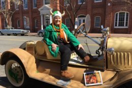 “I am Irish and I’m part Viking, hence the horns,” Debbie Bell told WTOP as she sat on the 1923 Model T Ford Speedster she and her husband brought up from Fredericksburg, Va. Bell donned a plush green and white helmet with a shamrock in the middle and gold horns pointed skyward. (WTOP/Liz Anderson)