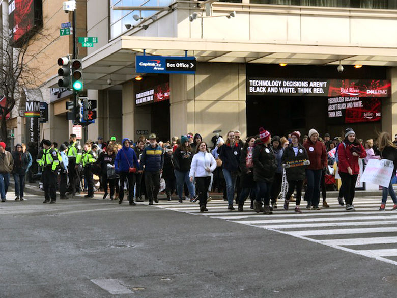 Protesters arriving to Pennsylvania Avenue. (WTOP/Steve Dresner)