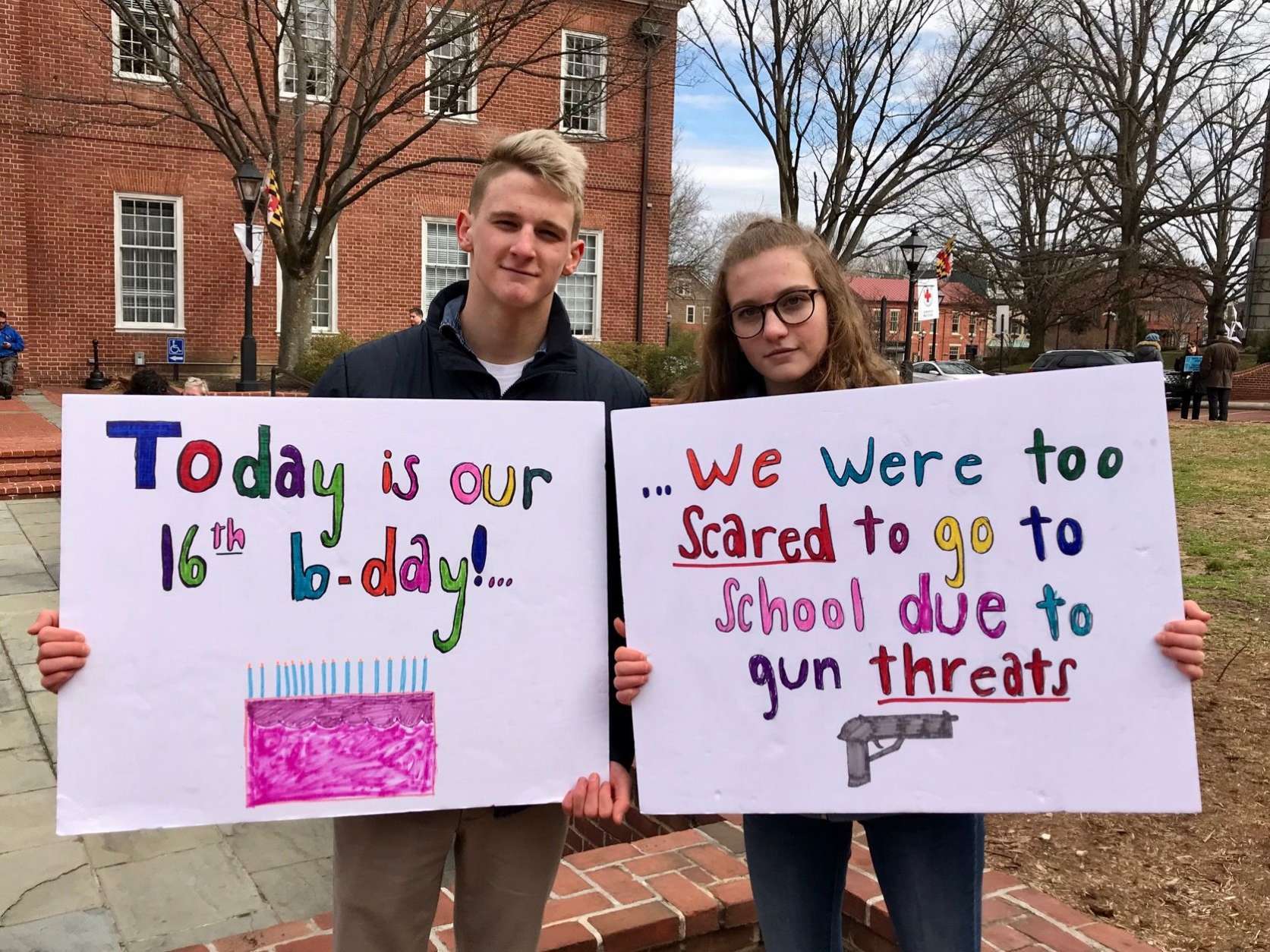 Jack and Karis Arnold took part of their 16th birthday for activism, demonstrating in favor of legislation to better protect students. (WTOP/Megan Cloherty)