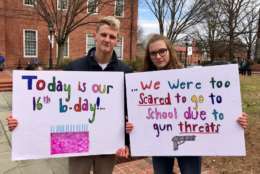 Jack and Karis Arnold took part of their 16th birthday for activism, demonstrating in favor of legislation to better protect students. (WTOP/Megan Cloherty)