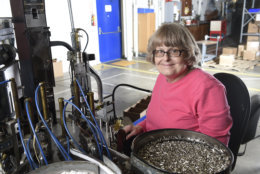 Lynn Larson, a machine operator at Industries of the Blind in Greensboro, North Carolina, manufacturing the SKILCRAFT U.S. Government pen. She has been working for the organization for nearly 40 years. (Courtesy National Indsutries for the Blind)