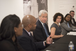 IMAGE DISTRIBUTED FOR JPMORGAN CHASE &amp; CO. - JPMorgan Chase &amp; Co. Chairman and CEO Jamie Dimon, center, takes part in a Community Roundtable/Meet and Greet at the Anacostia Arts Center on Wednesday, April 18, 2018 in Washington. (Kevin Wolf/AP Images for JPMorgan Chase &amp; Co.)