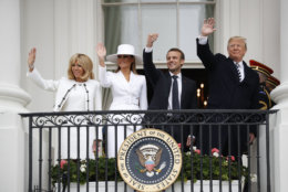 President Donald Trump, French President Emmanuel Macron, first lady Melania Trump and Brigitte Macron wave from the White House balcony during a State Arrival Ceremony at the White House in Washington, Tuesday, April 24, 2018. (AP Photo/Pablo Martinez Monsivais)