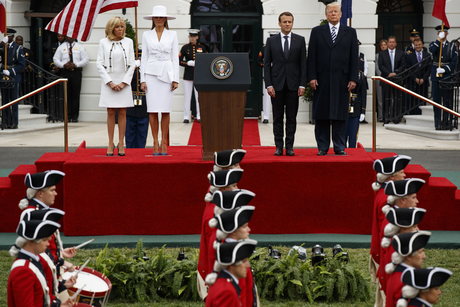Brigitte Macron, first lady Melania Trump, French President Emmanuel Macron, and President Donald Trump look on during a State Arrival Ceremony on the South Lawn of the White House, Tuesday, April 24, 2018, in Washington. (AP Photo/Evan Vucci)