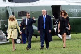 President Donald Trump, first lady Melania Trump, French President Emmanuel Macron and his wife Brigitte Macron arrive on Marine One at Mount Vernon, the home of President George Washington, in Mount Vernon, Va., Monday, April 23, 2018. (AP Photo/Susan Walsh)