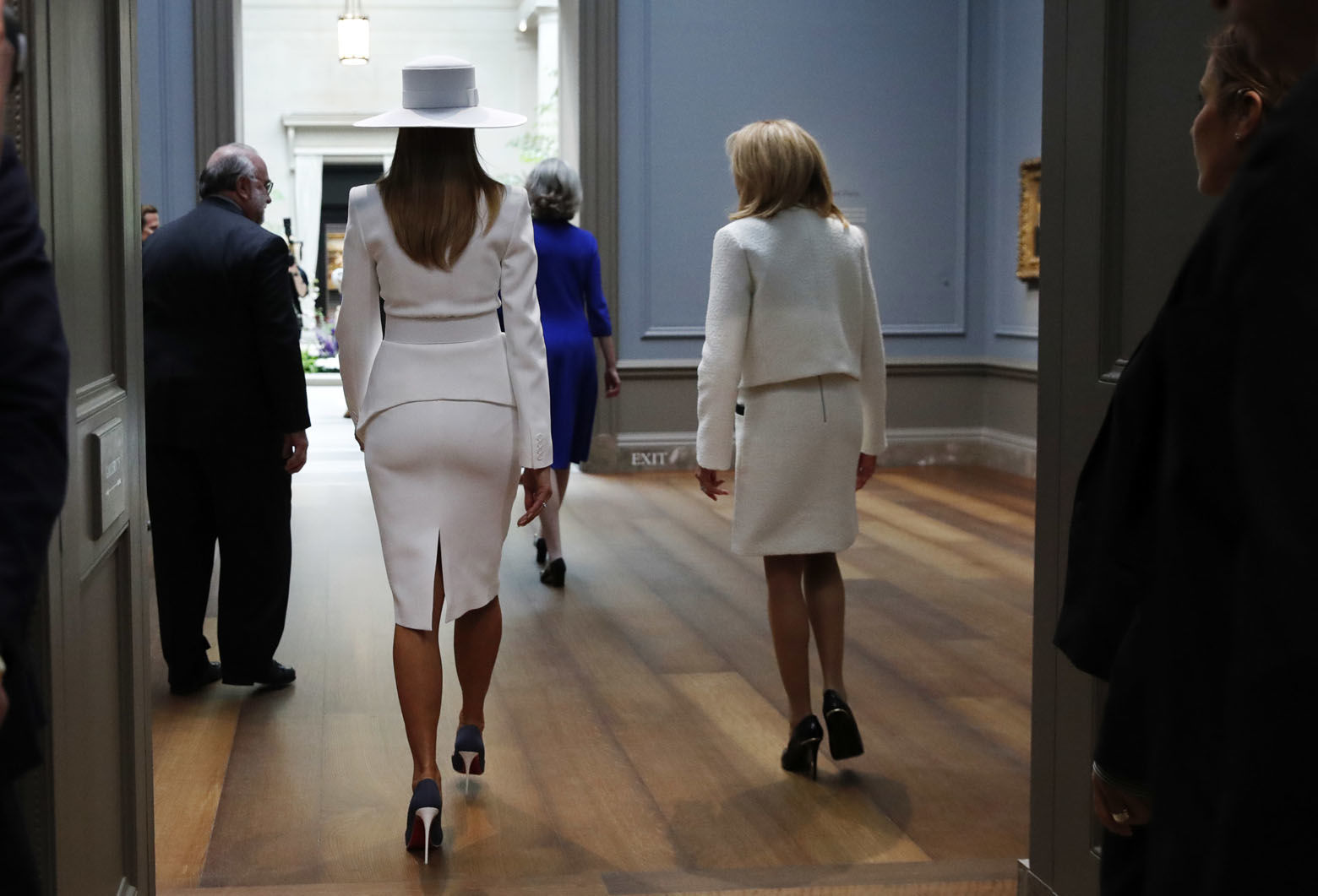 First lady Melania Trump, left, and Brigitte Macron, wife of French President Emmanuel Macron, tour the National Gallery of Art, Tuesday April 24, 2018, in Washington. (AP Photo/Jacquelyn Martin)