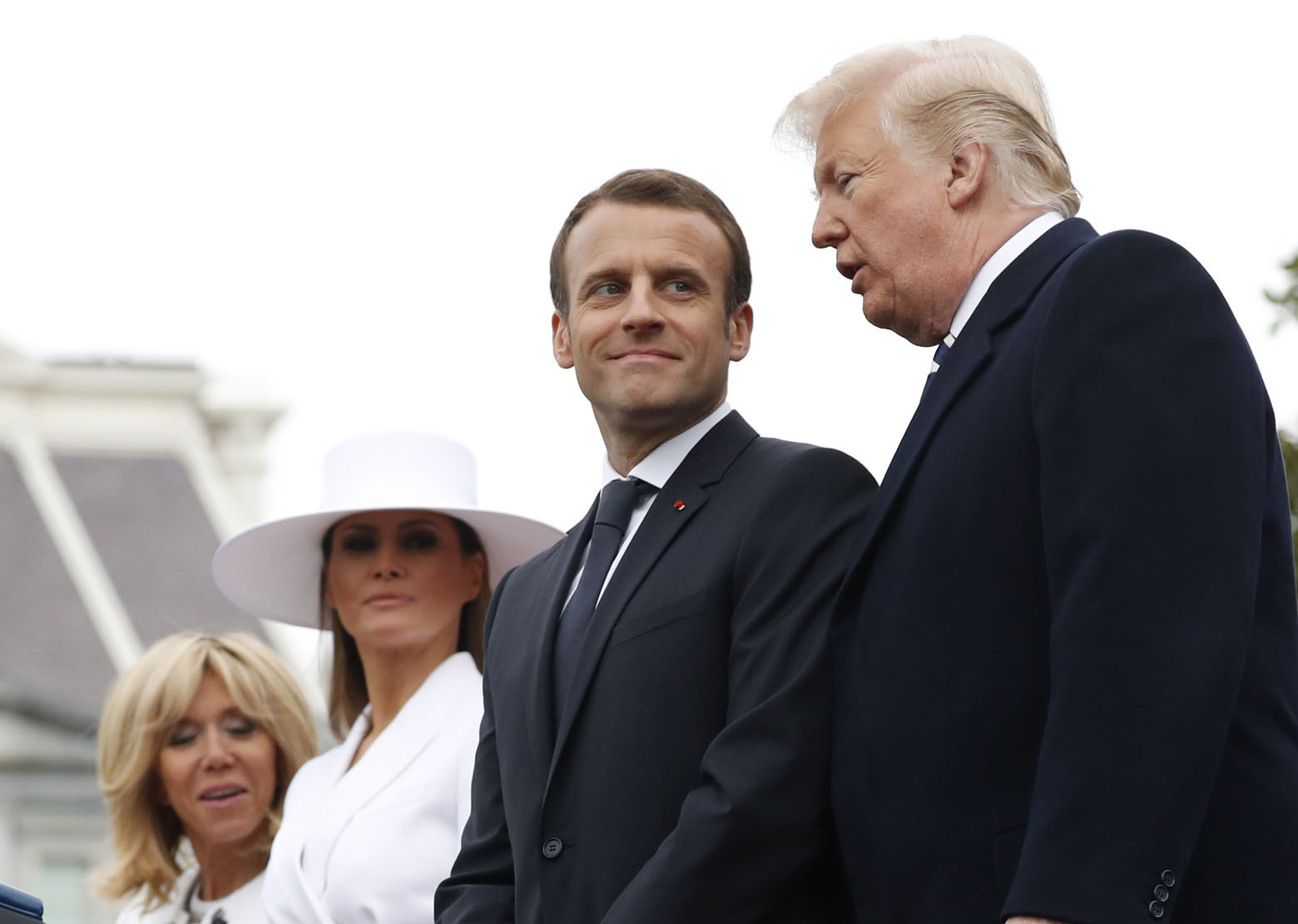 President Donald Trump, French President Emmanuel Macron, first lady Melania Trump, and Brigitte Macron stand during a State Arrival Ceremony on the South Lawn of the White House in Washington, Tuesday, April 24, 2018. (AP Photo/Pablo Martinez Monsivais)