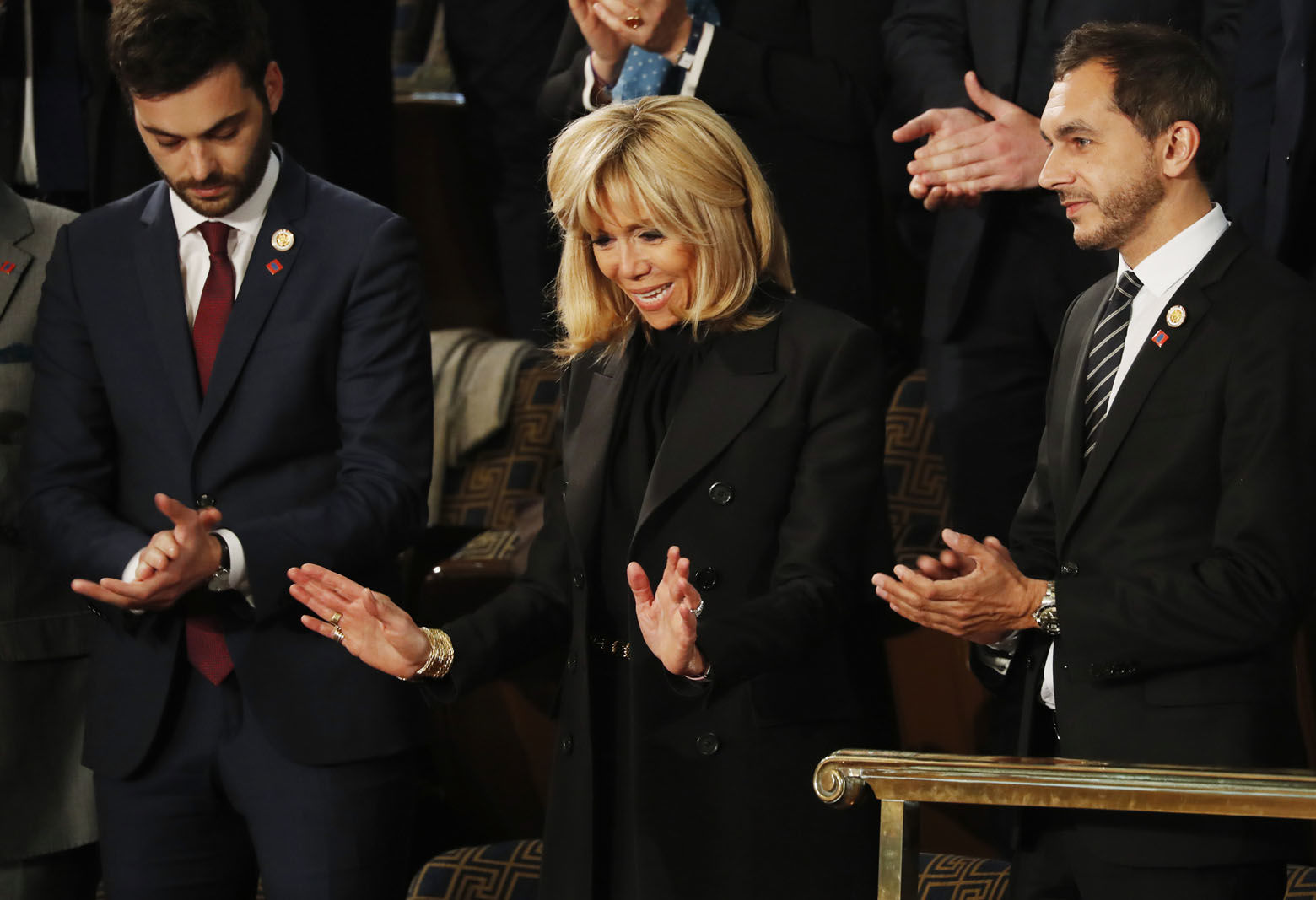 Brigitte Macron waves as she arrives ahead of French President Emmanuel Macron address to a joint meeting of Congress on Capitol Hill in Washington, Wednesday, April 25, 2018. (AP Photo/Pablo Martinez Monsivais)