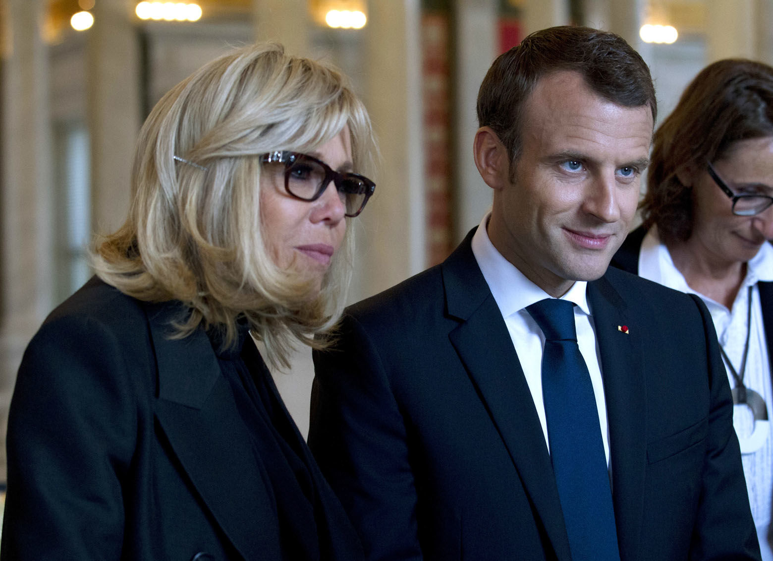 French President Emmanuel Macron and his wife Brigitte Macron speak with historians and curators after their visit to the Library of Congress on Wednesday, April 25, 2018, in Washington.  ( AP Photo/Jose Luis Magana)