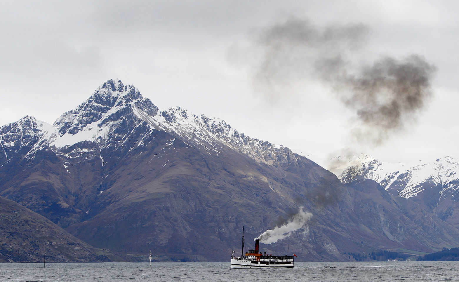 The coal fired steam ship Earnslaw turns on Lake Wakatipu as she comes into dock at Queenstown, New Zealand, Thursday, Sept., 15, 2011. (AP Photo/Alastair Grant)