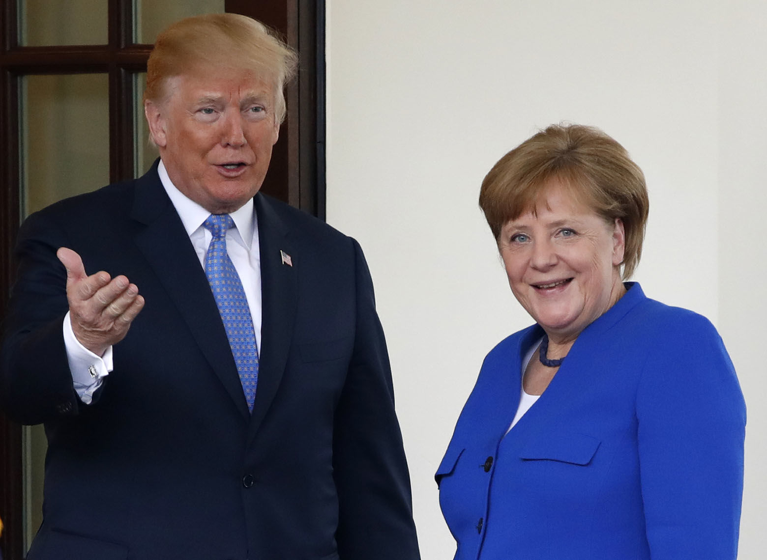 President Donald Trump greets German Chancellor Angela Merkel, Friday April 27, 2018, at the White House in Washington. (AP Photo/Jacquelyn Martin)