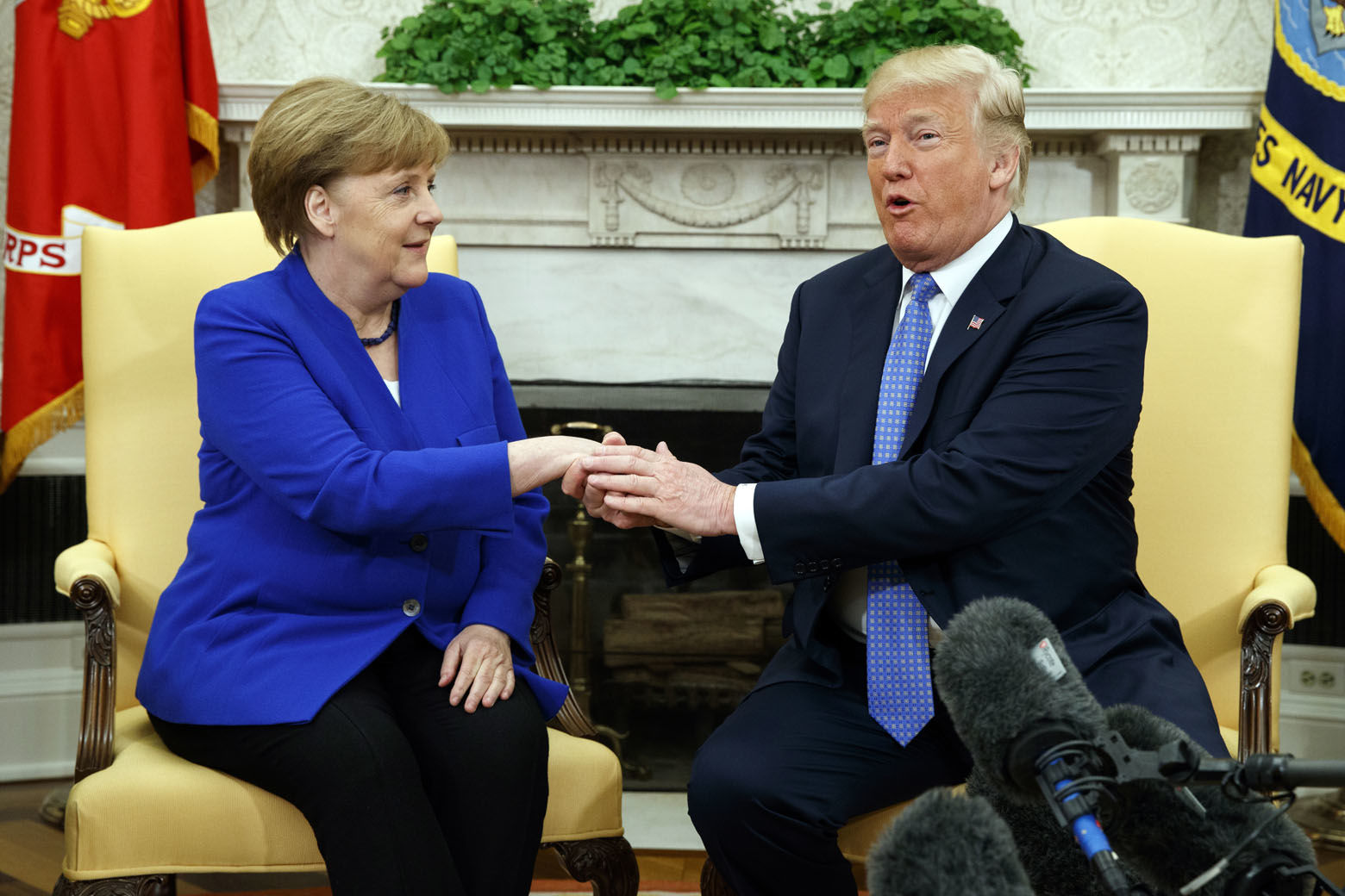 President Donald Trump meets with German Chancellor Angela Merkel in the Oval Office of the White House, Friday, April 27, 2018, in Washington. (AP Photo/Evan Vucci)