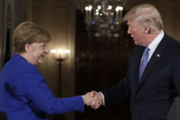 President Donald Trump shakes hands with German Chancellor Angela Merkel at the end of their news conference in the East Room of the White House, Friday, April 27, 2018, in Washington. (AP Photo/Evan Vucci)