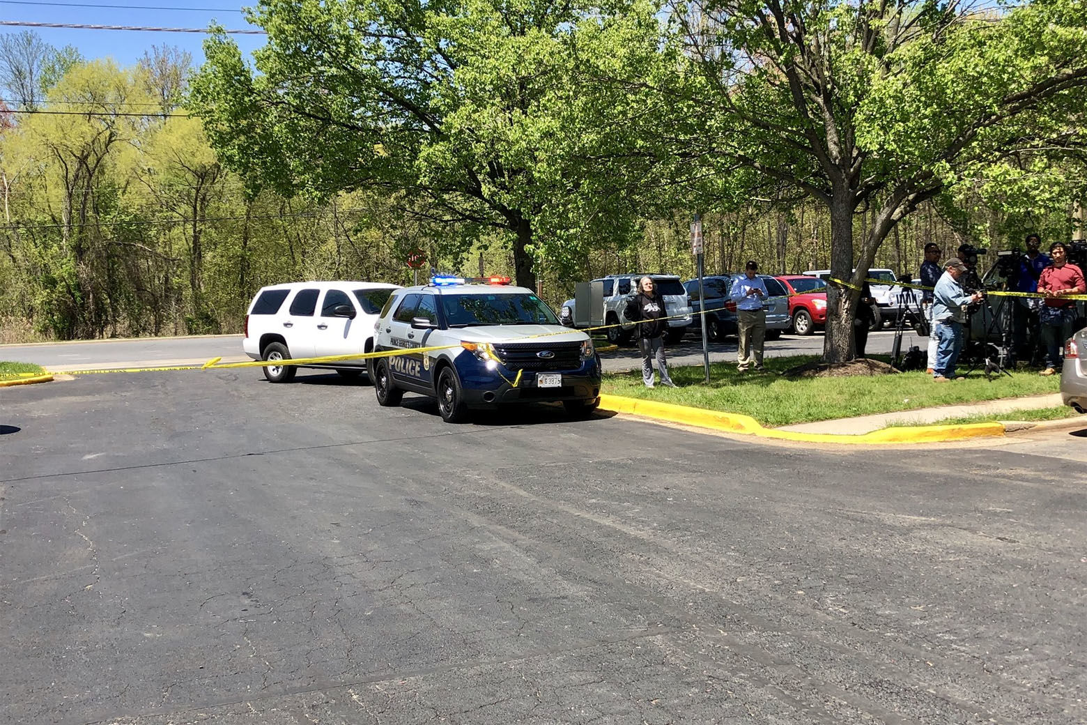 The media staging area in a parking lot in the 5800 block of Cherrywood Lane in Greenbelt, Maryland, where an armed robbery suspect was shot by a Prince George's County police officer during an arrest. (Courtesy Prince George's County police)
