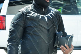 A man dressed as a character from the movie, "Black Panther" arrives at Awesome Con 2018 at the Walter E. Washington Convention Center in Washington, D.C. (Shannon Finney)