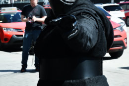 A woman dressed as Kylo Ren from the Star Wars film series strikes a pose at Awesome Con 2018 at the Walter E. Washington Convention Center in Washington, D.C. (Shannon Finney)