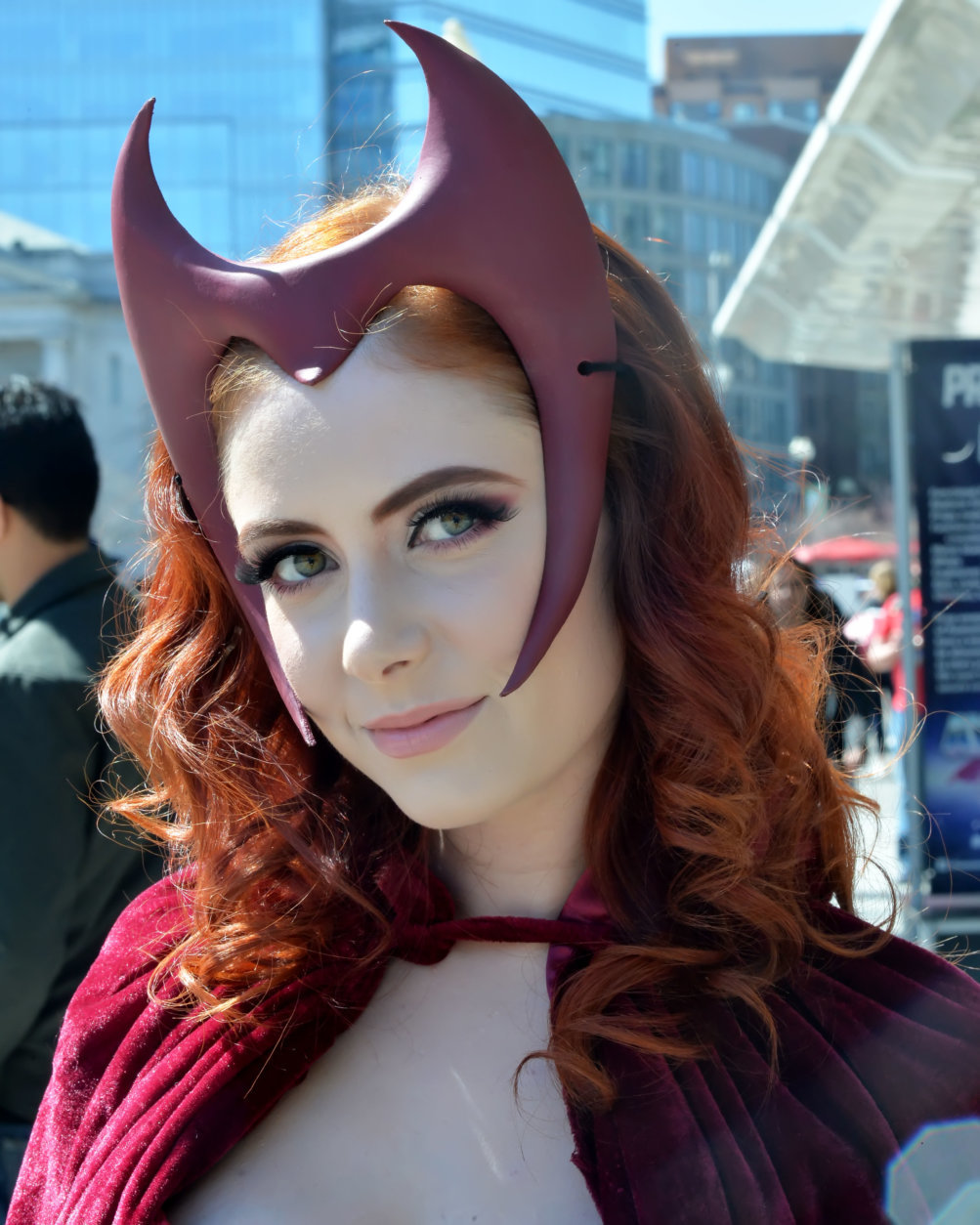 A woman dressed as the Scarlet Witch character from the Marvel Avengers comic book series and film arrives at Awesome Con 2018 at the Walter E. Washington Convention Center in Washington, D.C.