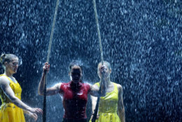 Acrobats rehearse their routine with a dramatic on-stage rainstorm. (Courtesy Shannon Finney)