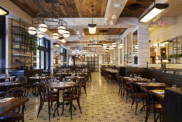 //3877's design of The Smith (901 F St. NW) sets black and white tile on the brasserie's floors against contrasting tile on the wall. (Courtesy //3877 ; Clarence Butts)