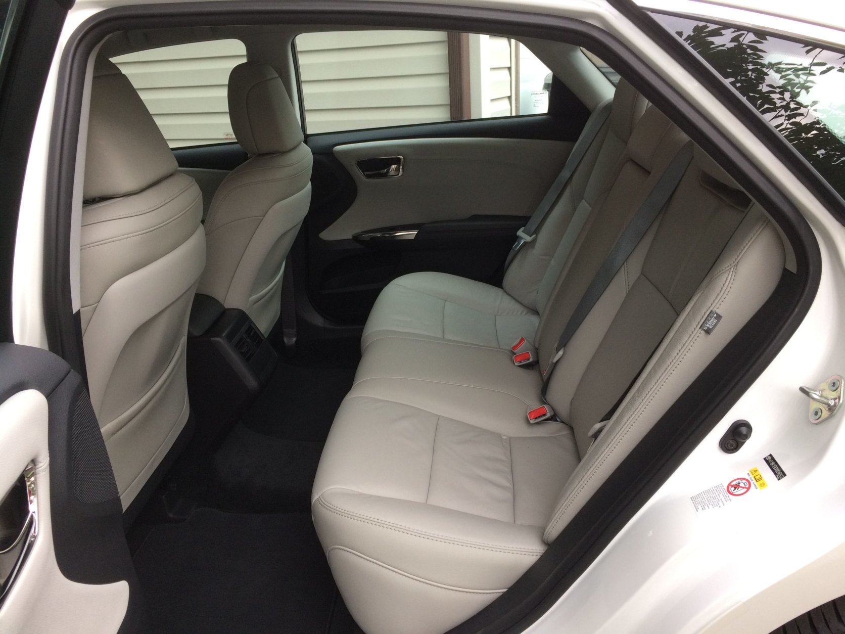 Rear seat riders have good leg room and head room, and it’s easy to get in and out of with a large door that opens wide, but the rear seats do not fold down. (WTOP/Mike Parris)