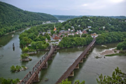 ** ADVANCE FOR WEEKEND EDITIONS, JUNE 13-14 ** FILE - This July 20, 2008 file photo offers a view looking down on Harpers Ferry, W.Va., at the conjunction of the Shanandoah, left, and the Potomac Rivers. The town was the site of abolitionist John Brown's infamous 1859 raid on the local arsenal, an event which led toward the Civil War. (AP/ Martin B. Cherry)