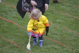 A child participates in the annual White House Easter Egg Roll on the South Lawn of the White House in Washington, Monday, April 2, 2018. (AP Photo/Pablo Martinez Monsivais)