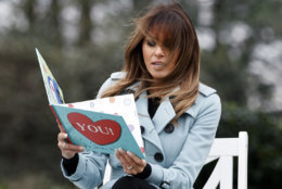 First lady Melania Trump reads from the book "You!" By Sandra Magsamen at the White House in Washington, Monday, April 2, 2018, during the annual White House Easter Egg Roll. (AP Photo/Carolyn Kaster)