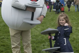 IMAGE DISTRIBUTED FOR AMERICAN EGG BOARD - The Incredible Egg mascot Eggy works out with an attendee of the 2018 White House Easter Egg Roll on the South Lawn on Monday, April 2, 2018, in Washington. (Kevin Wolf/AP Images for American Egg Board)