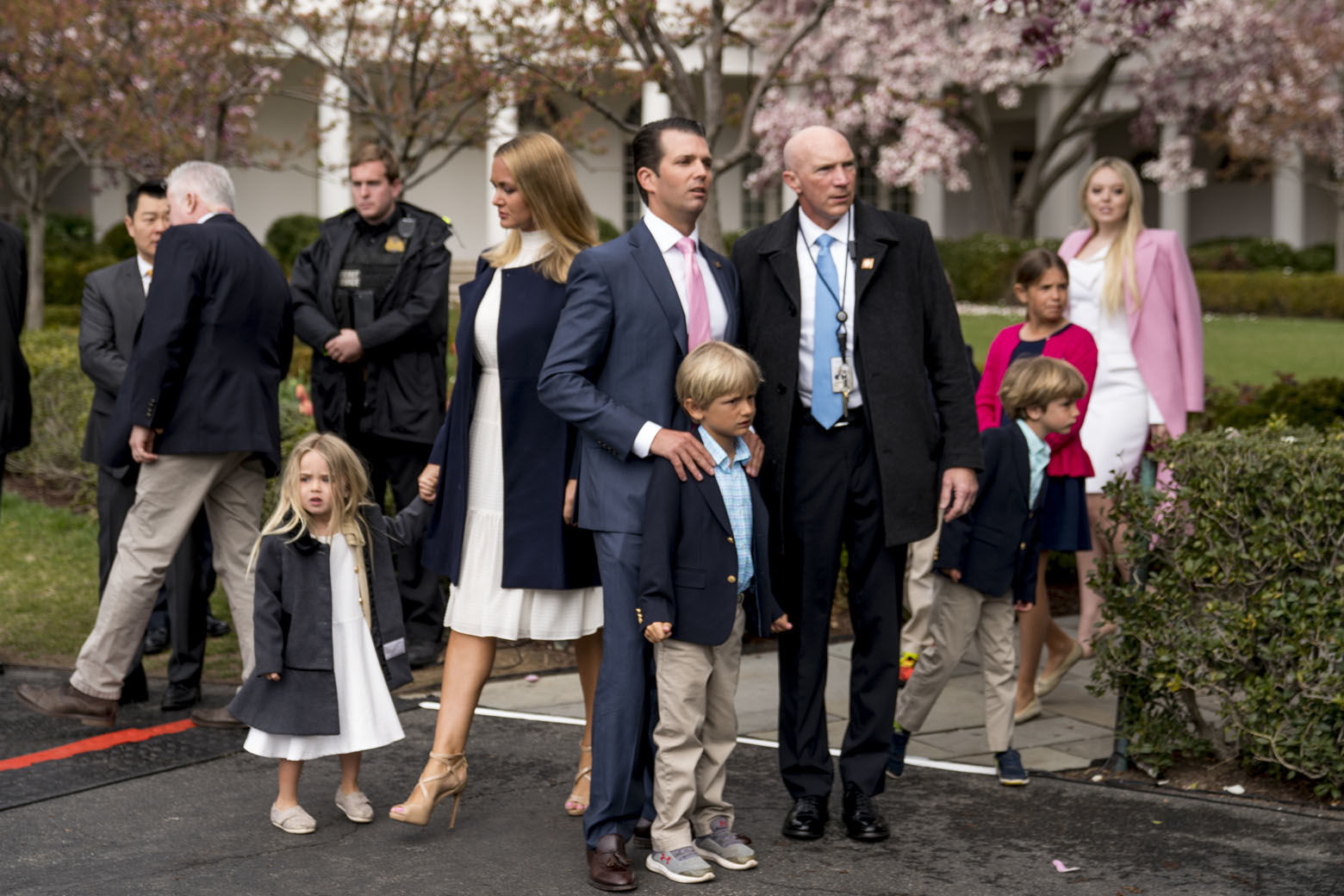 Donald Trump Jr., the son of President Donald Trump, center, and his wife Vanessa Trump, center left, arrive with children at the annual White House Easter Egg Roll on the South Lawn of the White House in Washington, Monday, April 2, 2018. Also pictured is Tiffany Trump, the Daughter of President Donald Trump, right. (AP Photo/Andrew Harnik)