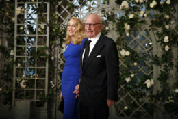 Jerry Hall and Rupert Murdoch arrive for a State Dinner with French President Emmanuel Macron and President Donald Trump at the White House, Tuesday, April 24, 2018, in Washington. (AP Photo/Alex Brandon)
