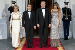 President Donald Trump, first lady Melania Trump, French President Emmanuel Macron and his wife Brigitte Macron, pose for photographs as they arrive for a State Dinner at the White House in Washington, Tuesday, April 24, 2018. (AP Photo/Andrew Harnik)